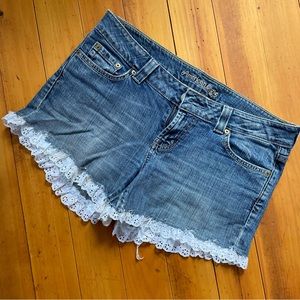 Distressed denim shorts